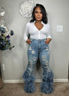 Distressed pearl feather luxe jeans stretchy